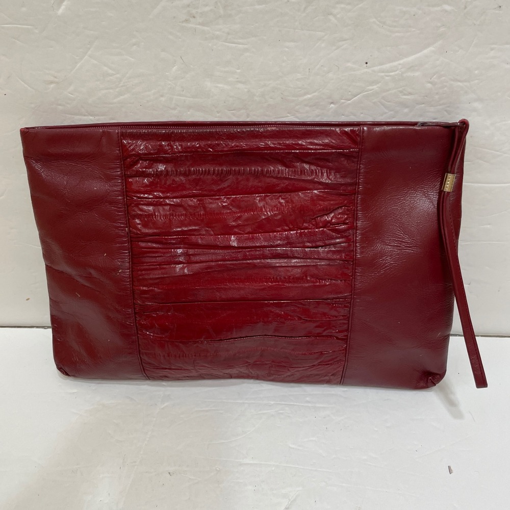 VINTAGE SUNCO GENUINE EELSKIN BAG IN DEEP RED